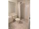 Tiled bathroom with shower and updated toilet at 2050 W Nido Ave, Mesa, AZ 85202