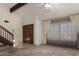 Inviting foyer with high ceilings, tiled flooring, and a staircase, creating a grand entrance at 2050 W Nido Ave, Mesa, AZ 85202