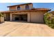 Two-story home with two-car garage and tile roof, offering ample parking and curb appeal at 2050 W Nido Ave, Mesa, AZ 85202