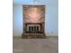 Cozy living room featuring a brick fireplace, creating a warm and inviting atmosphere at 2050 W Nido Ave, Mesa, AZ 85202