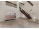 Large living room with high ceilings, staircase, and open floorplan at 2050 W Nido Ave, Mesa, AZ 85202