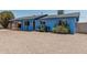 Inviting single-story home with a covered porch and easy-care desert landscaping at 2117 W 2Nd St, Mesa, AZ 85201