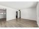 Spacious living room with wood-look flooring and easy access to the kitchen at 2117 W 2Nd St, Mesa, AZ 85201