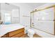 Bathroom featuring tile flooring, a single sink vanity, and a shower with a glass door at 22019 N 59Th Dr, Glendale, AZ 85310