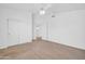 Spacious bedroom with a ceiling fan and closet offers ample storage space at 22019 N 59Th Dr, Glendale, AZ 85310
