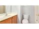 Bathroom featuring vanity with a single sink, toilet, and a bathtub/shower combo at 2311 E Hartford Ave # 29, Phoenix, AZ 85022