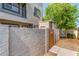 Exterior showcasing stucco and a gated entrance for added privacy at 2311 E Hartford Ave # 29, Phoenix, AZ 85022