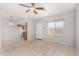 Open living room with neutral paint, tile flooring and plenty of natural light at 2311 E Hartford Ave # 29, Phoenix, AZ 85022