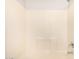 Shower with built-in seat and tile surround at 2311 E Hartford Ave # 29, Phoenix, AZ 85022