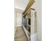 The mud room has custom cabinets and storage, wood-look floors, and decor with wicker baskets at 2501 S Roanoke St, Gilbert, AZ 85295