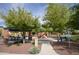 Charming community playground with a covered picnic area, benches, and a walking path at 2501 S Roanoke St, Gilbert, AZ 85295
