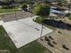 Aerial view of a community park basketball court, walking paths, near Gathering recreational amenities and green space at 2512 E Katrina Trl, Casa Grande, AZ 85194
