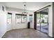 Breakfast nook with tile flooring, three windows, a sliding glass door and exterior views at 2512 E Katrina Trl, Casa Grande, AZ 85194