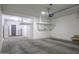 Spacious garage with a hanging shelf and an attached water filter at 2512 E Katrina Trl, Casa Grande, AZ 85194