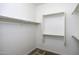 A walk-in closet has shelving and carpet floors at 2512 E Katrina Trl, Casa Grande, AZ 85194