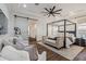 Luxurious bedroom with a four-poster bed, ensuite bathroom access, and stylish decor at 2625 N 24Th St # 15, Mesa, AZ 85213