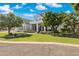 Beautiful two-story home boasts a well-maintained lawn, mature trees, and an inviting front entrance at 2625 N 24Th St # 15, Mesa, AZ 85213