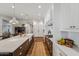 Large kitchen featuring an oversized island, custom cabinets, and stainless steel appliances at 2625 N 24Th St # 15, Mesa, AZ 85213