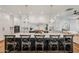 Bright kitchen showcasing a large center island with barstool seating and modern pendant lighting at 2625 N 24Th St # 15, Mesa, AZ 85213