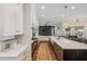 Gourmet kitchen featuring a large island, modern appliances, and an open layout to the living room at 2625 N 24Th St # 15, Mesa, AZ 85213