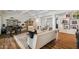 Spacious living room with elegant decor, a piano, and coffered ceilings at 2625 N 24Th St # 15, Mesa, AZ 85213