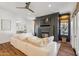 Cozy living room featuring a fireplace, large TV, and comfortable seating at 2625 N 24Th St # 15, Mesa, AZ 85213