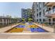 Beautiful courtyard with unique landscaping, including colorful stones and desert plants at 3131 N Central Ave # 3004, Phoenix, AZ 85012