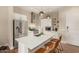 Stylish kitchen featuring a stainless steel refrigerator, center island with seating, and modern lighting at 3131 N Central Ave # 3004, Phoenix, AZ 85012