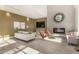 Inviting living room with modern furniture, a cozy fireplace, and a decorative mirror above the mantle at 3131 N Central Ave # 3004, Phoenix, AZ 85012