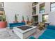 Inviting outdoor lounge with a fire pit, modern seating, and mature cacti at 3131 N Central Ave # 3004, Phoenix, AZ 85012