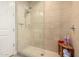 Modern walk-in shower featuring neutral colored tile and glass door at 3131 N Central Ave # 3004, Phoenix, AZ 85012