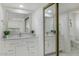 Bright bathroom with double sinks, modern vanity, and a large mirror at 3204 N Jay St, Chandler, AZ 85225