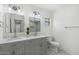 Bathroom featuring double sinks, a modern vanity, and updated fixtures at 3204 N Jay St, Chandler, AZ 85225