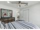 Bedroom with modern decor and ample space, complemented by a ceiling fan at 3204 N Jay St, Chandler, AZ 85225
