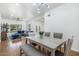 Open-concept layout with combined dining and living spaces featuring light wood floors and neutral color palette at 3204 N Jay St, Chandler, AZ 85225