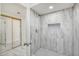 Beautiful bathroom shower with sleek fixtures, marble tile, and a built-in niche at 3204 N Jay St, Chandler, AZ 85225