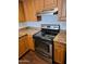 A close up of the stainless steel oven and laminate countertops in the kitchen at 3810 N Maryvale Pkwy # 2077, Phoenix, AZ 85031