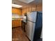 Kitchen with stainless steel appliances, wooden cabinets and laminate countertops at 3810 N Maryvale Pkwy # 2077, Phoenix, AZ 85031