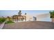 Spacious backyard featuring a covered patio and plenty of open space at 4040 E Becker Ln, Phoenix, AZ 85028