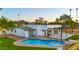 Aerial view of backyard showcasing a sparkling pool and patio at 4040 E Becker Ln, Phoenix, AZ 85028