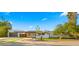 Beautiful home with modern design, desert landscaping, and mature trees at 4040 E Becker Ln, Phoenix, AZ 85028