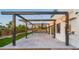 Covered patio with string lights and concrete flooring at 4040 E Becker Ln, Phoenix, AZ 85028