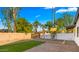Fenced backyard with play structure at 4040 E Becker Ln, Phoenix, AZ 85028