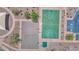 Aerial view of basketball court & sand volleyball court within the community at 40479 W Marion May Ln, Maricopa, AZ 85138
