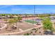 This community features a basketball court and sand volleyball court for outdoor recreation at 40479 W Marion May Ln, Maricopa, AZ 85138