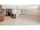 Modern kitchen featuring an island, stainless steel appliances, and ample counter space at 40479 W Marion May Ln, Maricopa, AZ 85138