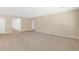 Spacious living area with tile flooring and neutral walls, ideal for customization at 40479 W Marion May Ln, Maricopa, AZ 85138