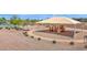 Community playground with a sunshade, play equipment, and landscaping at 40479 W Marion May Ln, Maricopa, AZ 85138