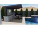 This outdoor kitchen has a built-in grill, bar seating and is adjacent to a sparkling pool at 40614 N Harbour Town Ct, Anthem, AZ 85086
