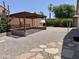 Large backyard featuring pergola, desert landscaping, privacy wall and firepit at 4224 E Renee Dr, Phoenix, AZ 85050